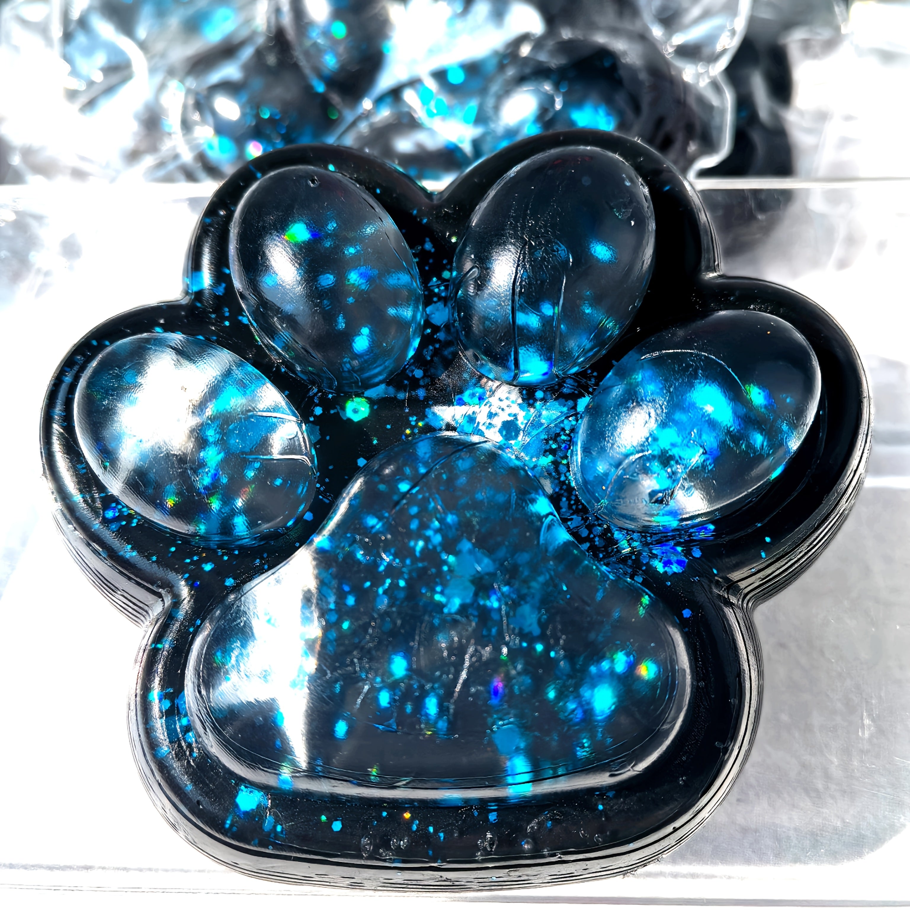 Gigantesque jouet à serrer la patte de chat bleu scintillant - Matériau TPR, jouet sensoriel interactif pour l'apprentissage et le plaisir au bureau, cadeau parfait pour un anniversaire ou une fête, temps de jeu interactif, design ludique, jouet durable