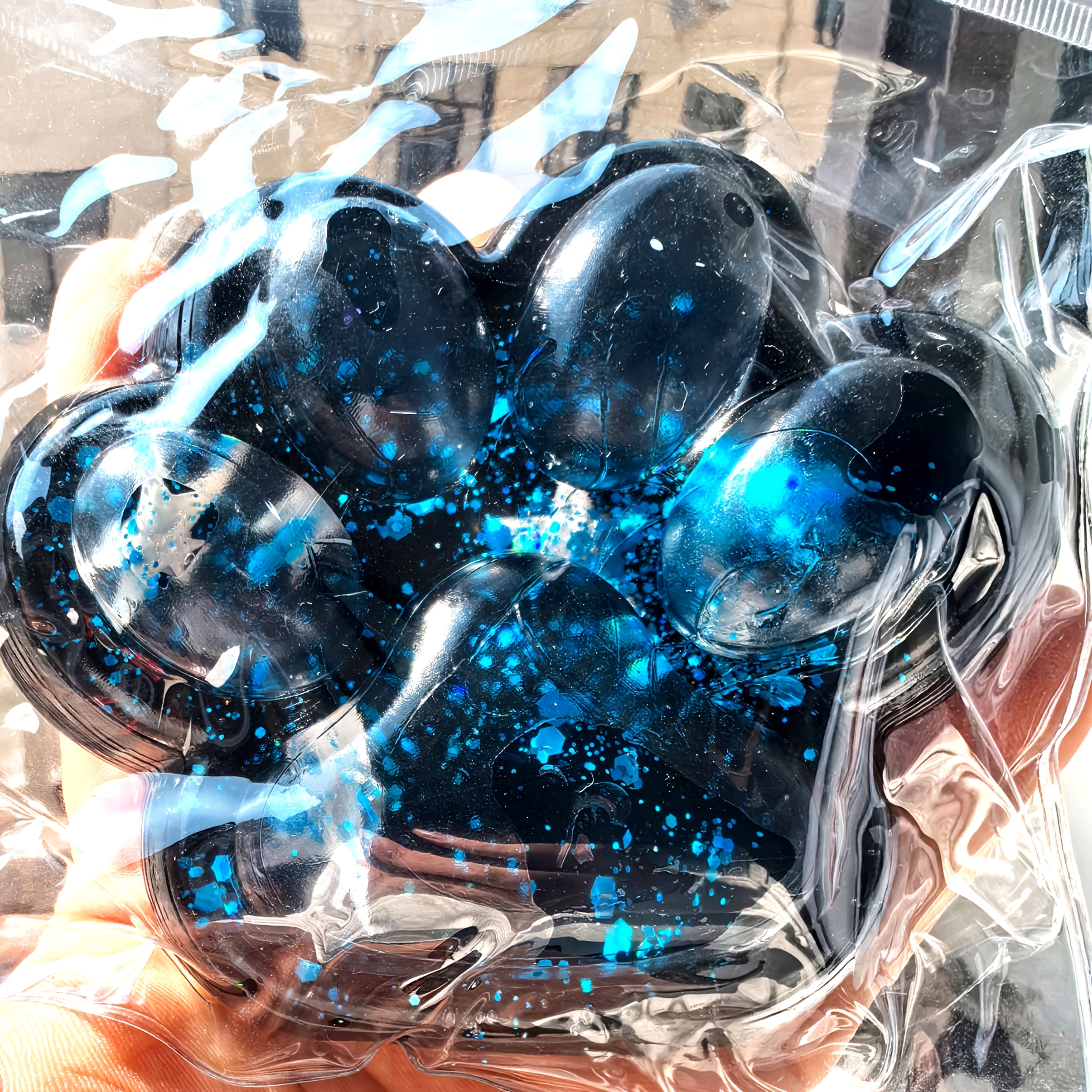 Gigantesque jouet à serrer la patte de chat bleu scintillant - Matériau TPR, jouet sensoriel interactif pour l'apprentissage et le plaisir au bureau, cadeau parfait pour un anniversaire ou une fête, temps de jeu interactif, design ludique, jouet durable